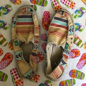 Sanuk slip ons